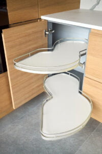 Kitchen access mechanism pull-out cabinet shelving for people living with disability