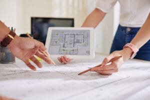 Occupational Therapy and Home Modification builder discussing blueprints