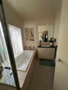 Photo of an old bathroom that is inaccessible to people with disabilities.