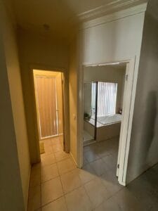 Photo of two doors showing separate toilet and bathroom